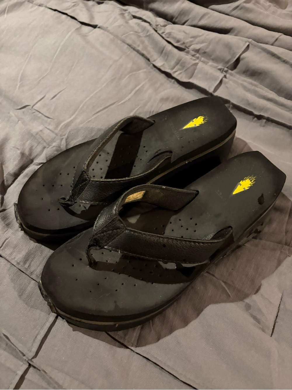 Volatile Black Leather Platform Flip Flop Sandals with Yellow Accent